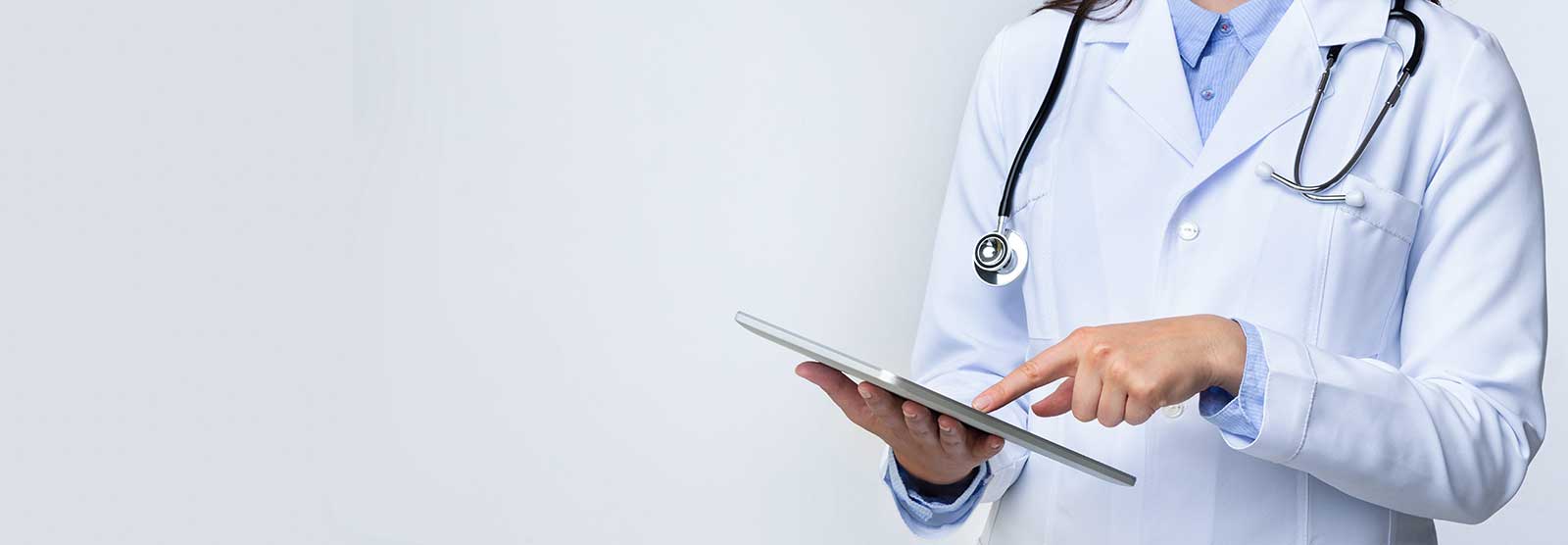 Photo of doctor with tablet