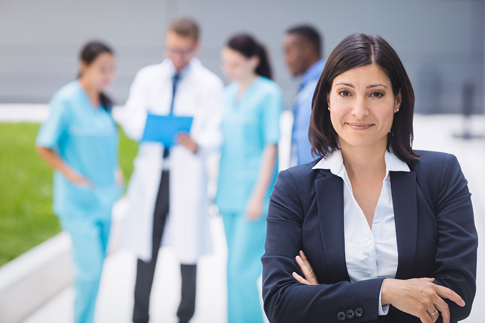 Female doctor with arms crossed